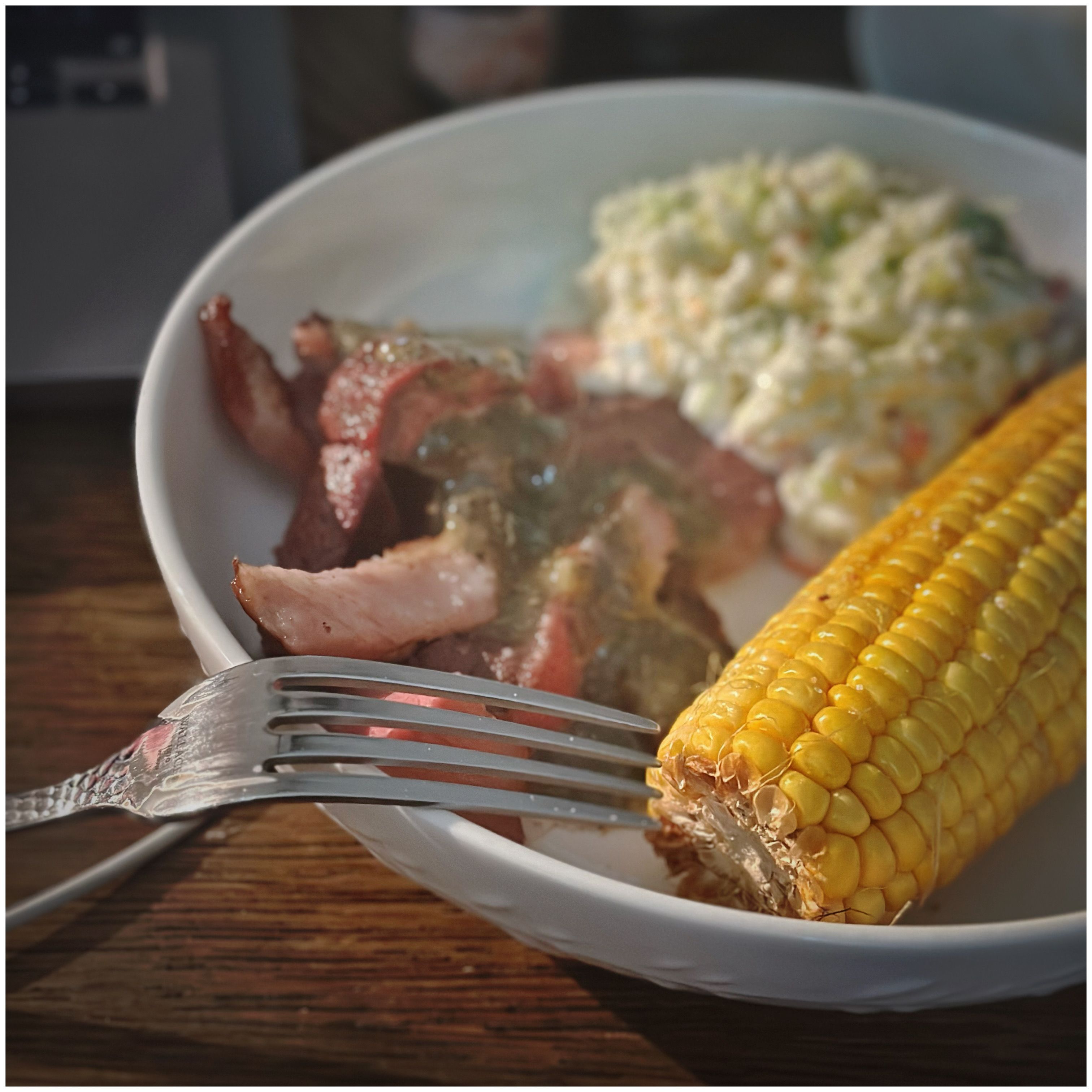 A plate of tasty picahna and corn